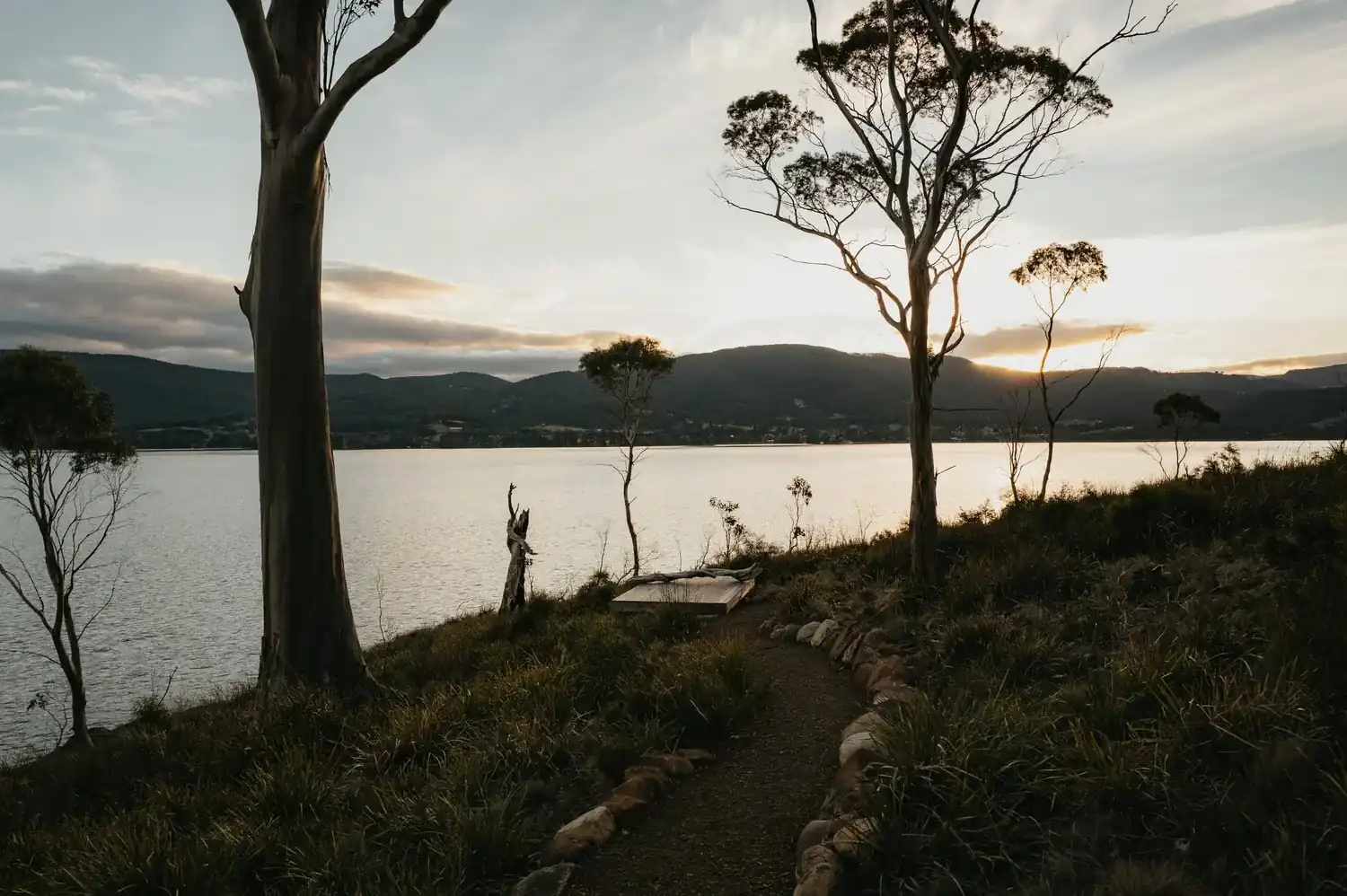 Path along the hillside above the D'Entrecasteaux Channel at golden hour
